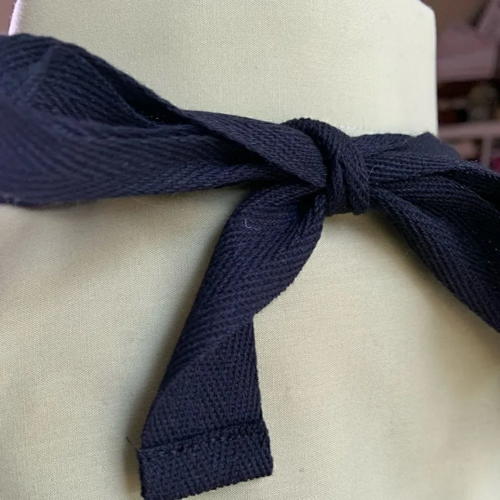 At Home with Susan Fleming personality apron “Sweet” black with tan thread